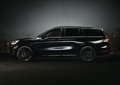 A 2024 Lincoln Aviator® SUV is shown in the Infinite Black exterior color | Bondy's Lincoln in Dothan AL