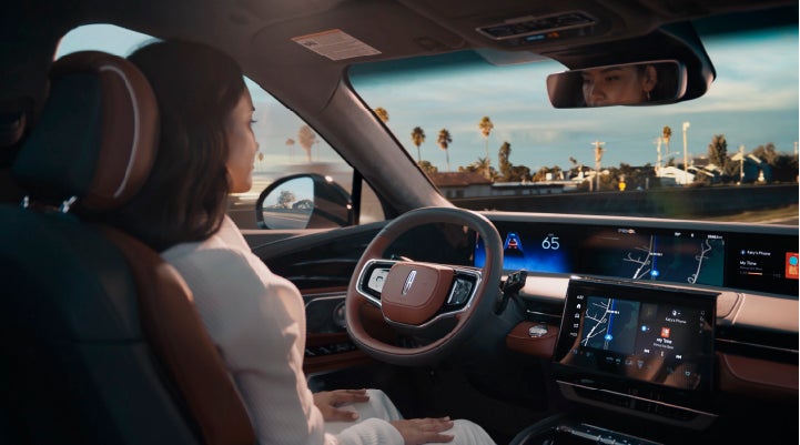 A person is shown driving hands-free on the highway with available Lincoln BlueCruise technology. | Bondy's Lincoln in Dothan AL