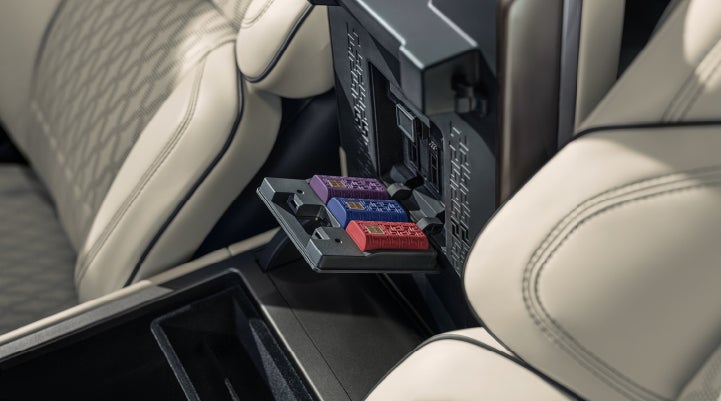 Digital Scent cartridges are shown in the diffuser located in the center arm rest. | Bondy's Lincoln in Dothan AL