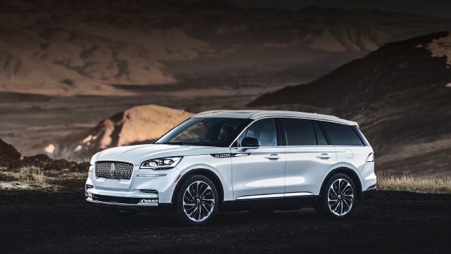 A 2024 Lincoln Aviator® SUV is parked at a mountain overlook | Bondy's Lincoln in Dothan AL