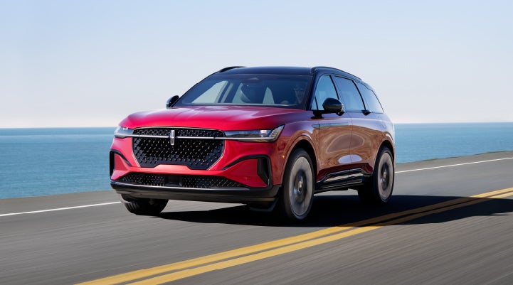 A 2024 Lincoln Nautilus® SUV is being driven on a seaside roadway. | Bondy's Lincoln in Dothan AL