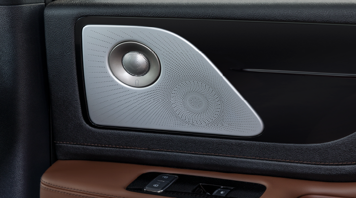 A close-up of a speaker located on the door’s interior is shown. | Bondy's Lincoln in Dothan AL