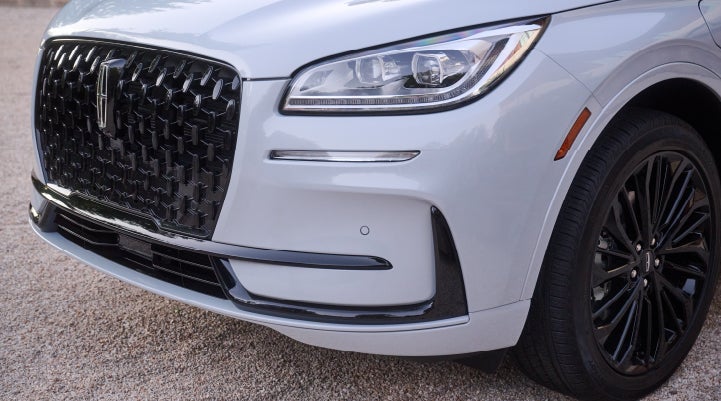 The all-black grille of the available Jet Appearance Package on a 2026 Lincoln Corsair® SUV is shown. | Bondy's Lincoln in Dothan AL