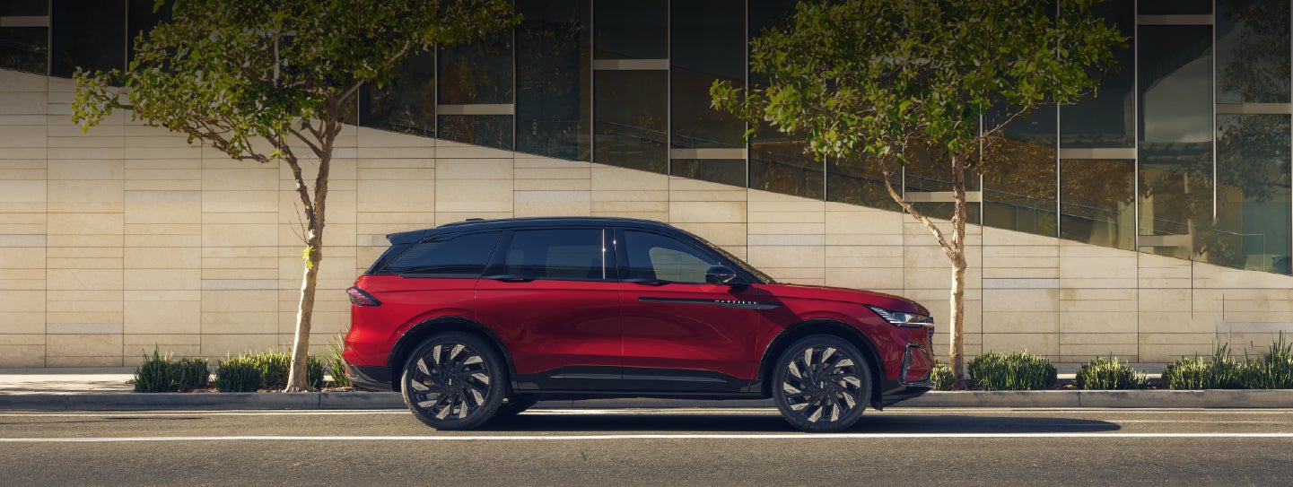 A 2026 Lincoln Nautilus® SUV with an available Hybrid Powertrain is parked in an urban setting. | Bondy's Lincoln in Dothan AL