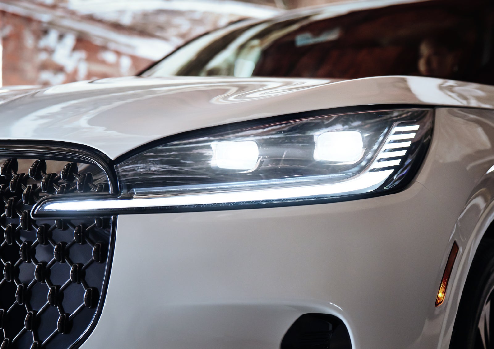A close-up of a headlamp on the 2027 Lincoln Aviator® SUV is shown. | Bondy's Lincoln in Dothan AL