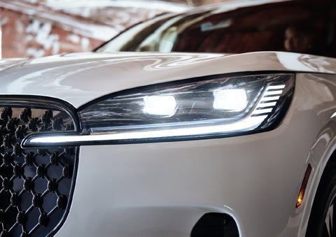 A close-up of a headlamp on the 2027 Lincoln Aviator® SUV is shown. | Bondy's Lincoln in Dothan AL